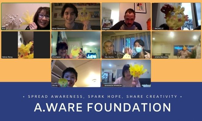 Screenshot of Aware Foundation art class on Zoom. Participants are holding up Easter bird crafts.