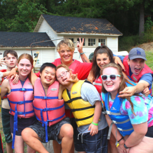 Group of campers in life jackets