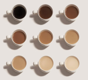 Nine cups with different choices of tea and coffee